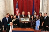 US Senator Sherrod Brown (D-OH) presenting award to honoree Aaron and Felicia Cohen, also on photo US Representative Debbie Wasserman Shultz